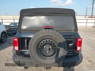 2022 Ford Bronco z VIN 1FMEE5BP3NLA74562, wystawiony jako IAAI lot #42338666 z przebiegiem 20 743 mil mil oraz . Historia ofert i sprzedaży dostępna na DreamBid. Obrazek 16.