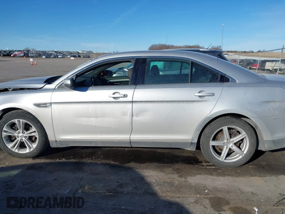 2013 Ford Taurus SEL with VIN 1FAHP2E83DG224780, listed as a IAAI auction lot 41675601 with 166,977 mi miles. Bid and sale history available at carsss.com. Image 14.