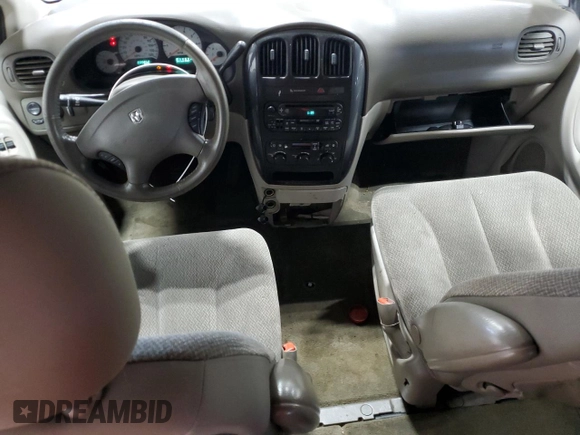 2005 Dodge Caravan SXT with VIN 2D4GP44L65R438530, listed as a Copart auction lot 63415955 with 220,852 mi miles and Salvage title. Bid and sale history available at DreamBid. Image 8.