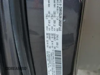 2014 Dodge Grand Caravan SXT 30th Anniversary with VIN 2C4RDGCG4ER285294, listed as a Copart auction lot 52109205 with 196,331 mi miles and Salvage Title. Bid and sale history available at DreamBid. Image 13.