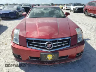 2009 Cadillac XLR Platinum z VIN 1G6YV36A595600621, wystawiony jako Copart lot #75302454 z przebiegiem Nie podano mil oraz Szkody całkowita. Historia ofert i sprzedaży dostępna na DreamBid. Obrazek 5.