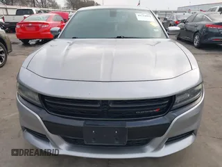 2015 Dodge Charger SXT with VIN 2C3CDXHG4FH884058, listed as a IAAI auction lot 41724894 with 202,701 mi miles and . Bid and sale history available at DreamBid. Image 13.