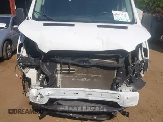 2019 Ford Transit with VIN 1FTYR2CM0KKB82003, listed as a IAAI auction lot 42693012 with 76,937 mi miles and . Bid and sale history available at DreamBid. Image 6.