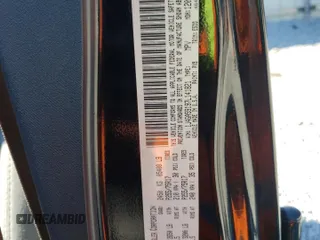 2007 Jeep Wrangler Unlimited Sahara with VIN 1J4GA59197L141821, listed as a Copart auction lot 76897044 with 124,070 mi miles and Salvage title. Bid and sale history available at DreamBid. Image 13.