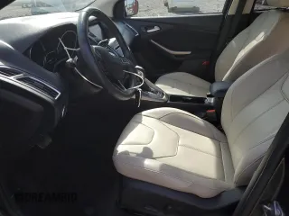 2015 Ford Focus Titanium с VIN 1FADP3J2XFL200668, выставлен на аукционе Copart как лот 54010865 с пробегом 138 459 миль миль и Списание • Salvage title. История ставок и продаж доступна на DreamBid. Изображение 7.