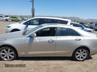 2013 Cadillac ATS Luxury z VIN 1G6AH5R35D0147866, wystawiony jako IAAI lot #42328457 z przebiegiem 142 197 mil mil oraz . Historia ofert i sprzedaży dostępna na DreamBid. Obrazek 14.