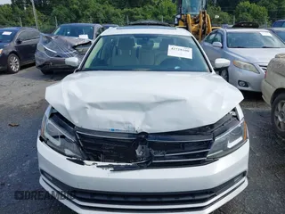 2016 Volkswagen Jetta SEL z VIN 3VWL07AJ0GM376263, wystawiony jako IAAI lot #42728100 z przebiegiem 213 315 mil mil oraz . Historia ofert i sprzedaży dostępna na DreamBid. Obrazek 12.