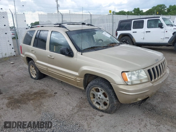 1999 Jeep Grand Cherokee Limited with VIN 1J4GW68SXXC664055, listed as a IAAI auction lot 42339125 with 219,792 mi miles and . Bid and sale history available at DreamBid. Image 1.