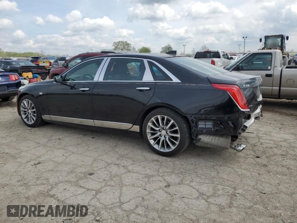 2016 Cadillac CT6 Luxury AWD with VIN 1G6KD5RS8GU165637, listed as a Copart auction lot 55574075 with 34,675 mi miles and Salvage title. Bid and sale history available at DreamBid. Image 2.