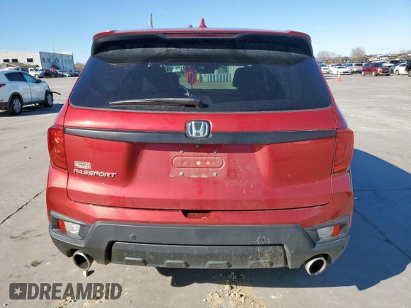 2022 Honda Passport EX-L with VIN 5FNYF7H53NB001890, listed as a Copart auction lot 47427425 with 70,374 mi miles and Salvage title. Bid and sale history available at DreamBid. Image 6.