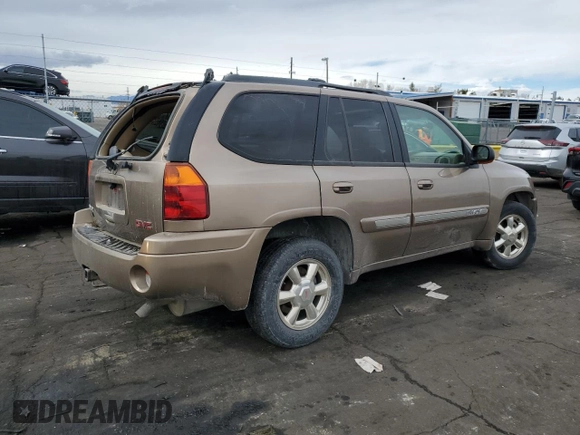 2002 GMC Envoy SLT with VIN 1GKDT13SX22353269, listed as a Copart auction lot 45421375 with 212,027 mi miles and Salvage Title. Bid and sale history available at carsss.com. Image 3.