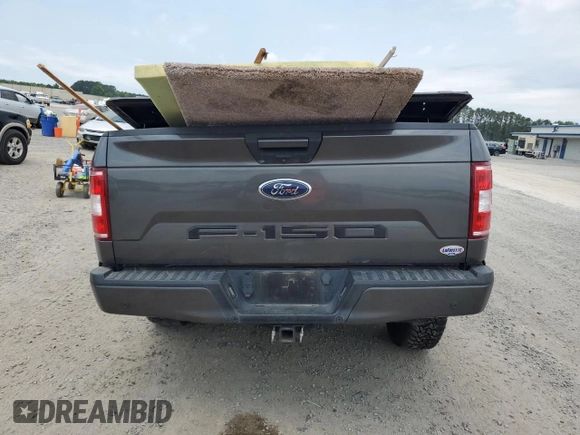 2018 Ford F-150 XL with VIN 1FTEW1E54JFD50664, listed as a Copart auction lot 57517945 with 106,649 mi miles and Salvage title. Bid and sale history available at DreamBid. Image 6.