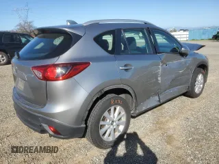 2014 Mazda CX-5 Sport with VIN JM3KE2BE1E0350718, listed as a Copart auction lot 46370205 with 98,065 mi miles and Salvage title. Bid and sale history available at DreamBid. Image 3.