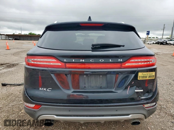 2016 Lincoln MKC Select z VIN 5LMCJ2C95GUJ27886, wystawiony jako Copart lot #60280645 z przebiegiem 165 973 mil mil oraz Szkoda całkowita • Salvage title. Historia ofert i sprzedaży dostępna na DreamBid. Obrazek 6.