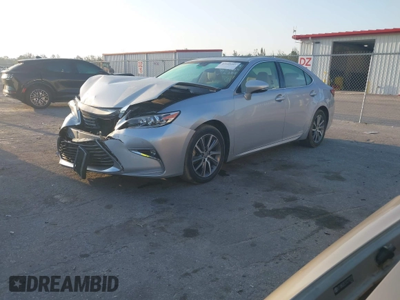 2016 Lexus ES 300h z VIN JTHBW1GG7G2115384, wystawiony jako IAAI lot #42103591 z przebiegiem 86 598 mil mil oraz . Historia ofert i sprzedaży dostępna na DreamBid. Obrazek 17.