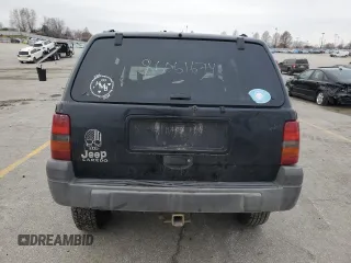1998 Jeep Grand Cherokee Laredo with VIN 1J4FX58S1WC348125, listed as a Copart auction lot 86061674 with 0 mi miles and Salvage Title. Bid and sale history available at carsss.com. Image 6.