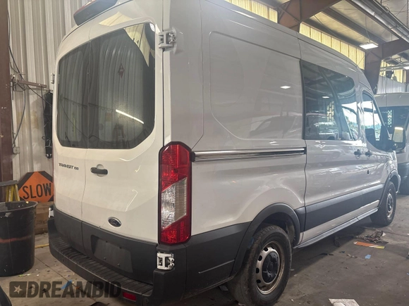 2018 Ford Transit with VIN 1FTYE1CM1JKB31128, listed as a IAAI auction lot 42737735 with 208,336 mi miles and . Bid and sale history available at DreamBid. Image 14.