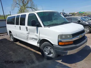 2014 Chevrolet Express Passenger LT with VIN 1GAZG1FG3E1184146, listed as a IAAI auction lot 42002722 with 103,075 mi miles and . Bid and sale history available at DreamBid. Image 1.