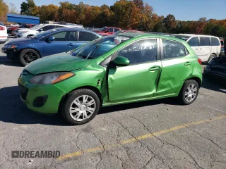 2013 Mazda Mazda2 Sport with VIN JM1DE1KY4D0166670, listed as a Copart auction lot 76109374 with 157,189 mi miles and Salvage Title. Bid and sale history available at carsss.com. Image 1.