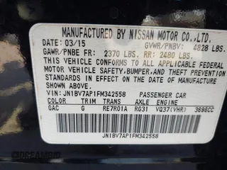 2015 Infiniti Q50 Premium with VIN JN1BV7AP1FM342558, listed as a IAAI auction lot 41975803 with 140,603 mi miles. Bid and sale history available at carsss.com. Image 9.