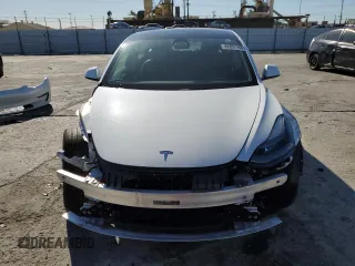 2023 Tesla Model 3 with VIN 5YJ3E1EA7PF557358, listed as a Copart auction lot 48891985 with 20,673 mi miles and Salvage title. Bid and sale history available at DreamBid. Image 5.