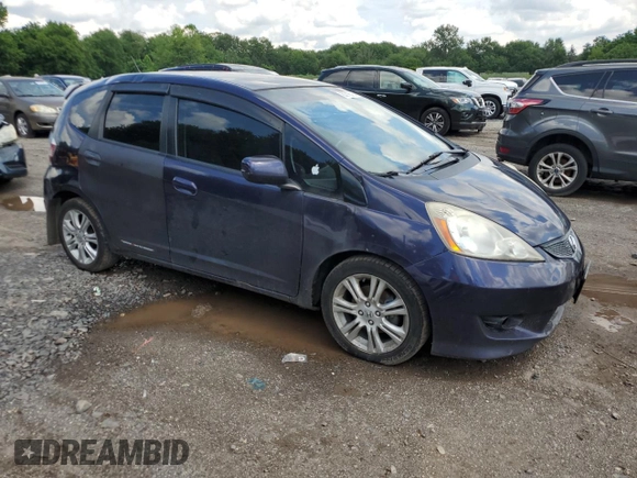 2010 Honda Fit Sport with VIN JHMGE8H44AC013385, listed as a Copart auction lot 63216515 with 228,358 mi miles and Salvage title. Bid and sale history available at DreamBid. Image 4.