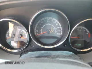 2010 Dodge Caliber Mainstreet z VIN 1B3CB3HA8AD565517, wystawiony jako Copart lot #60523535 z przebiegiem 99 982 mil mil oraz Szkoda całkowita • Salvage title. Historia ofert i sprzedaży dostępna na DreamBid. Obrazek 9.