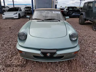 1986 Alfa Romeo Spider Veloce z VIN ZARBA5417G1040320, wystawiony jako Copart lot #48623735 z przebiegiem 134 891 mil mil oraz Tytuł czysty. Historia ofert i sprzedaży dostępna na DreamBid. Obrazek 5.