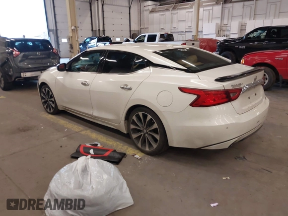 2016 Nissan Maxima SL with VIN 1N4AA6AP2GC399721, listed as a IAAI auction lot 41818252 with 64,386 mi miles and . Bid and sale history available at DreamBid. Image 3.