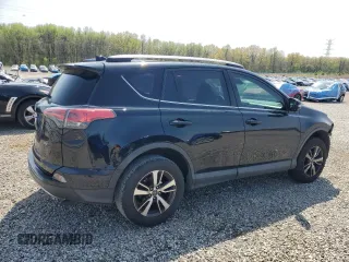 2018 Toyota RAV4 XLE with VIN 2T3WFREV4JW517610, listed as a Copart auction lot 51218285 with 193,684 mi miles and Clean Title. Bid and sale history available at DreamBid. Image 3.