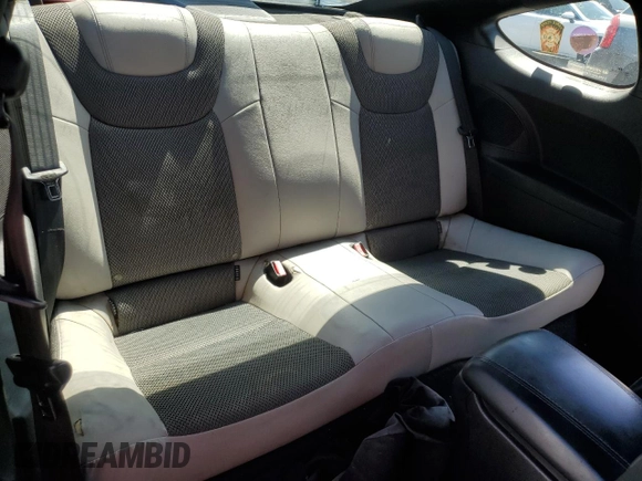 2013 Hyundai Genesis Coupe Premium z VIN KMHHT6KD1DU091383, wystawiony jako Copart lot #55207835 z przebiegiem 145 825 mil mil oraz Szkody całkowita. Historia ofert i sprzedaży dostępna na DreamBid. Obrazek 10.