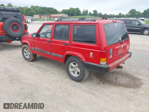 1999 Jeep Cherokee Sport z VIN 1J4FT68S9XL667355, wystawiony jako IAAI lot #42204435 z przebiegiem 217 178 mil mil oraz . Historia ofert i sprzedaży dostępna na DreamBid. Obrazek 3.