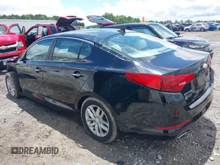 2013 Kia Optima LX z VIN 5XXGM4A71DG254889, wystawiony jako IAAI lot #42248455 z przebiegiem 203 443 mil mil oraz . Historia ofert i sprzedaży dostępna na DreamBid. Obrazek 3.