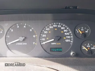1999 Jeep Grand Cherokee Laredo с VIN 1J4GW58N3XC623612, выставлен на аукционе IAAI как лот 42564352 с пробегом 156 808 миль миль и . История ставок и продаж доступна на DreamBid. Изображение 7.