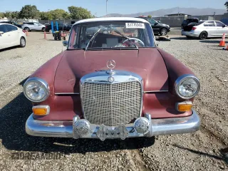 1966 Mercedes-Benz E with VIN 110C1012157487, listed as a Copart auction lot 81770344 with 68,662 mi miles and Salvage Title. Bid and sale history available at DreamBid. Image 5.