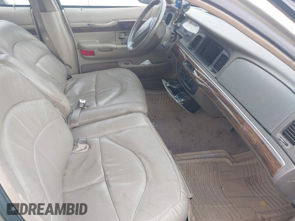 1999 Mercury Grand Marquis GS z VIN 2MEFM74W4XX645430, wystawiony jako IAAI lot #42154522 z przebiegiem 152 306 mil mil oraz . Historia ofert i sprzedaży dostępna na DreamBid. Obrazek 5.