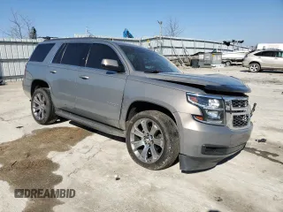 2018 Chevrolet Tahoe LS with VIN 1GNSCAKC5JR263554, listed as a Copart auction lot 48632805 with 87,445 mi miles and Salvage title. Bid and sale history available at DreamBid. Image 4.