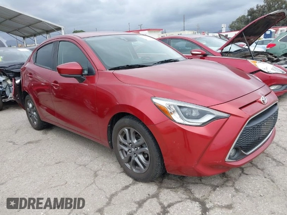 2019 Toyota Yaris L z VIN 3MYDLBYV6KY511548, wystawiony jako IAAI lot #41725445 z przebiegiem 62 628 mil mil oraz . Historia ofert i sprzedaży dostępna na DreamBid. Obrazek 1.