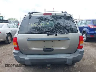 2001 Jeep Grand Cherokee Laredo z VIN 1J4GW48S01C658017, wystawiony jako IAAI lot #42160310 z przebiegiem 220 309 mil mil oraz . Historia ofert i sprzedaży dostępna na DreamBid. Obrazek 17.