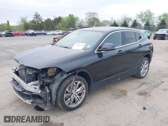 2018 BMW X2 xDrive28i with VIN WBXYJ5C34JEF72637, listed as a IAAI auction lot 42064330 with 96,725 mi miles. Bid and sale history available at carsss.com. Image 2.