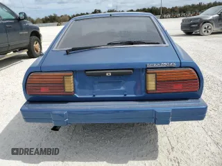 1982 Datsun 280ZX z VIN JN1HZ04S5CX457910, wystawiony jako Copart lot #77132604 z przebiegiem 261 383 mil mil oraz Szkody całkowita. Historia ofert i sprzedaży dostępna na DreamBid. Obrazek 6.