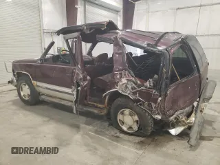 1995 Chevrolet Tahoe z VIN 1GNEK13KXSJ427631, wystawiony jako Copart lot #52624475 z przebiegiem 228 492 mil mil oraz Nie do naprawy. Historia ofert i sprzedaży dostępna na DreamBid. Obrazek 2.