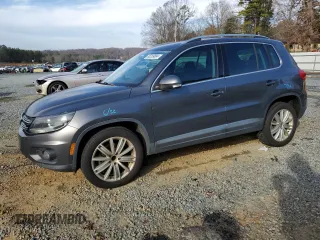 2013 Volkswagen Tiguan SE with VIN WVGAV3AX8DW574007, listed as a Copart auction lot 85289684 with 159,073 mi miles and Salvage title. Bid and sale history available at DreamBid. Image 1.