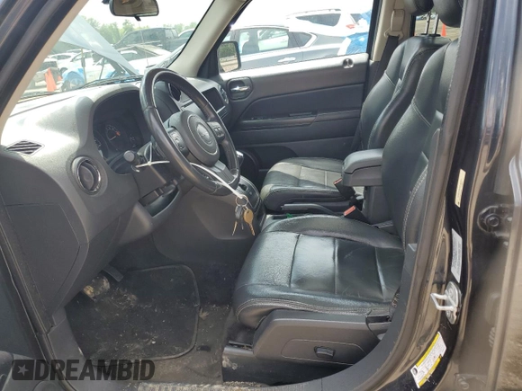 2015 Jeep Patriot High Altitude with VIN 1C4NJPFA4FD192777, listed as a Copart auction lot 54716275 with 104,368 mi miles and Salvage title. Bid and sale history available at DreamBid. Image 7.