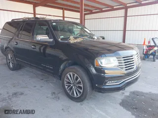 2015 Lincoln Navigator L with VIN 5LMJJ3JT0FEJ12569, listed as a IAAI auction lot 41909517 with 165,631 mi miles. Bid and sale history available at carsss.com. Image 1.