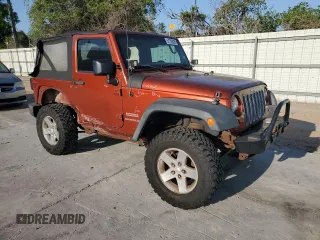 2014 Jeep Wrangler Sport with VIN 1C4AJWAG8EL169530, listed as a Copart auction lot 51788825 with 197,642 mi miles and Salvage Title. Bid and sale history available at carsss.com. Image 4.