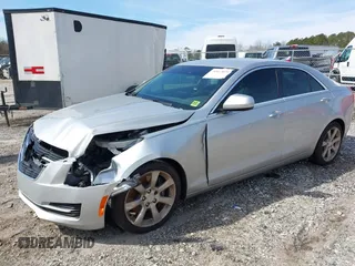 2016 Cadillac ATS Standard RWD with VIN 1G6AA5RA6G0101521, listed as a IAAI auction lot 41617029 with 94,356 mi miles and . Bid and sale history available at DreamBid. Image 2.