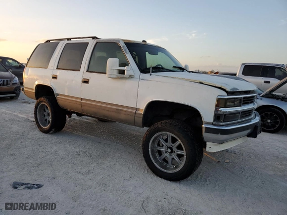 1999 Chevrolet Tahoe with VIN 1GNEC13R2XJ556769, listed as a Copart auction lot 77561624 with 205,238 mi miles and Non Repairable. Bid and sale history available at carsss.com. Image 4.