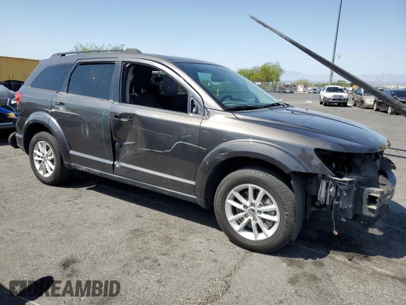 2017 Dodge Journey SXT with VIN 3C4PDCBB5HT701487, listed as a Copart auction lot 58821045 with 118,585 mi miles and Salvage title. Bid and sale history available at DreamBid. Image 4.