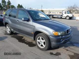 2003 BMW X5 3.0i with VIN 5UXFA53573LV83812, listed as a IAAI auction lot 41590046 with 166,841 mi miles. Bid and sale history available at carsss.com. Image 1.